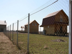 Забор из сетки рабицы в натяг с протяжкой арматуры 150 метров фото в Туапсе